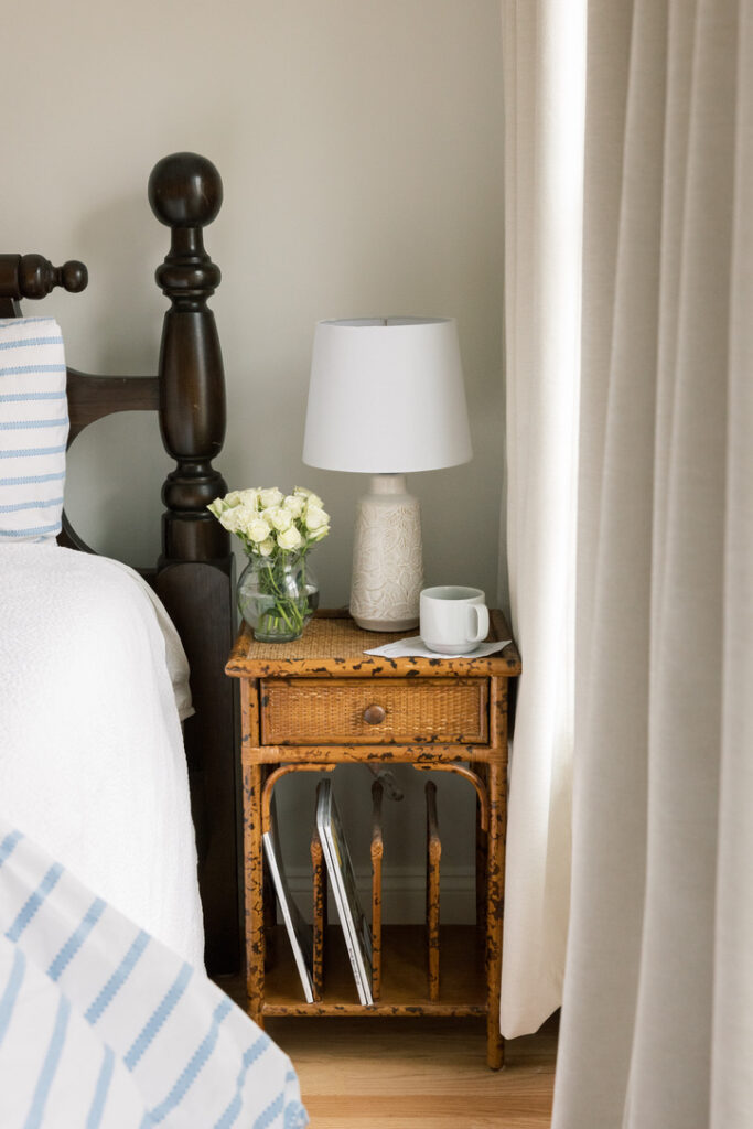 Guest room design with layered bedding, soft lighting, and a welcoming, hotel-inspired feel