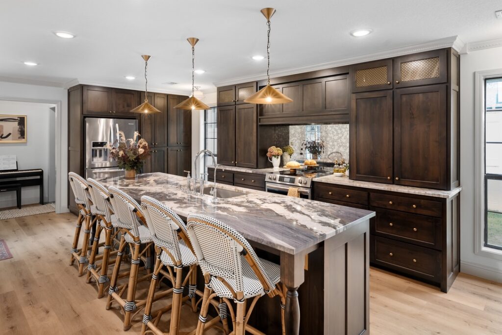 Kitchen remodel with timeless finishes, functional layout, and layered lighting